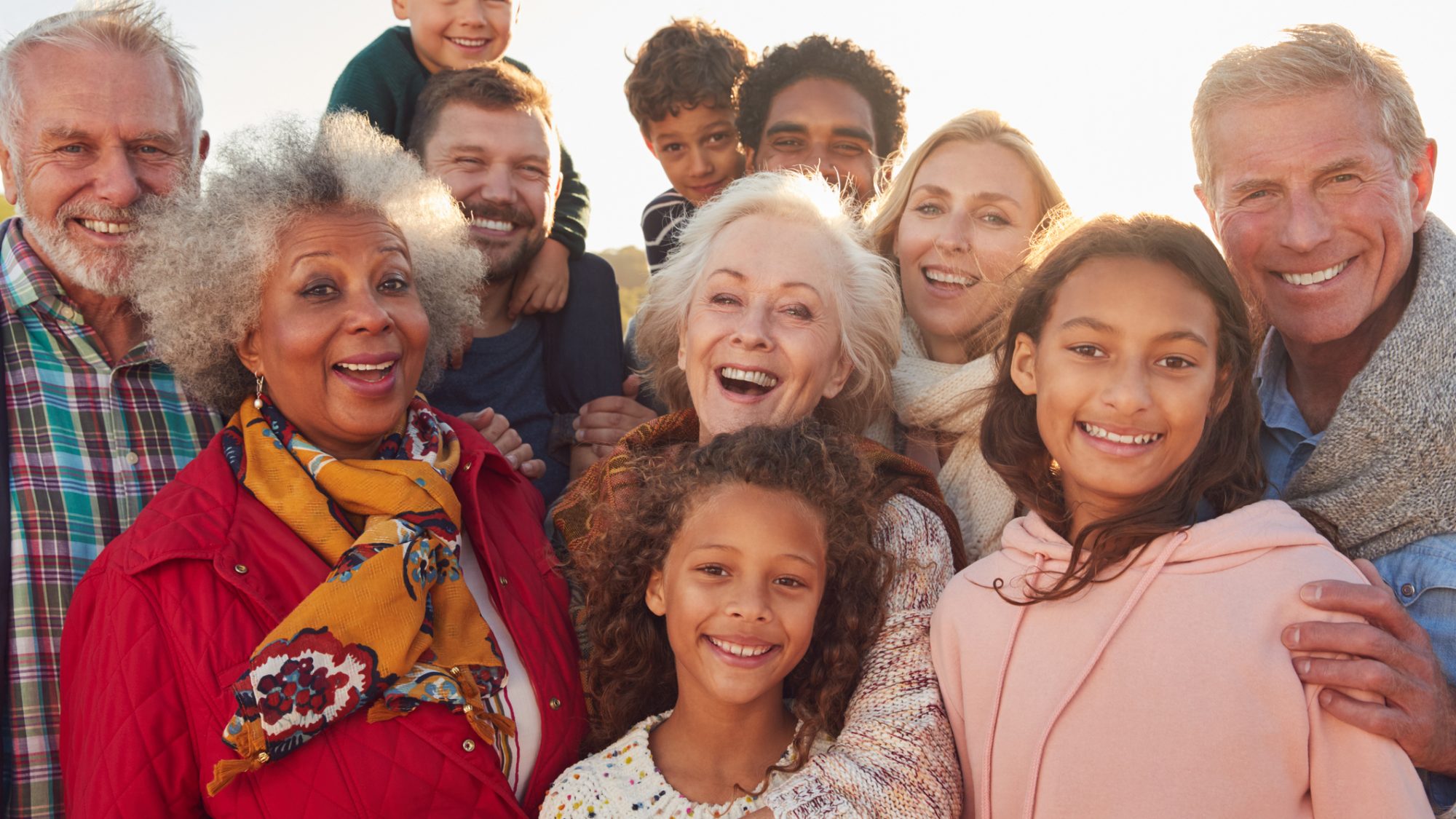 Portrait Of Multi-Generation Family Group On Winter Beach Vacation